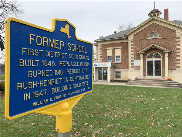 Photo of the sign outside the Rush post office